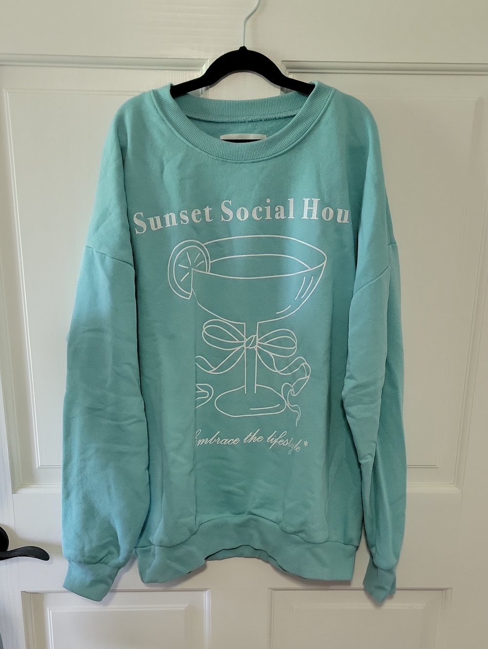 No Boundaries Light Blue Crewneck Sweatshirt with White Graphic